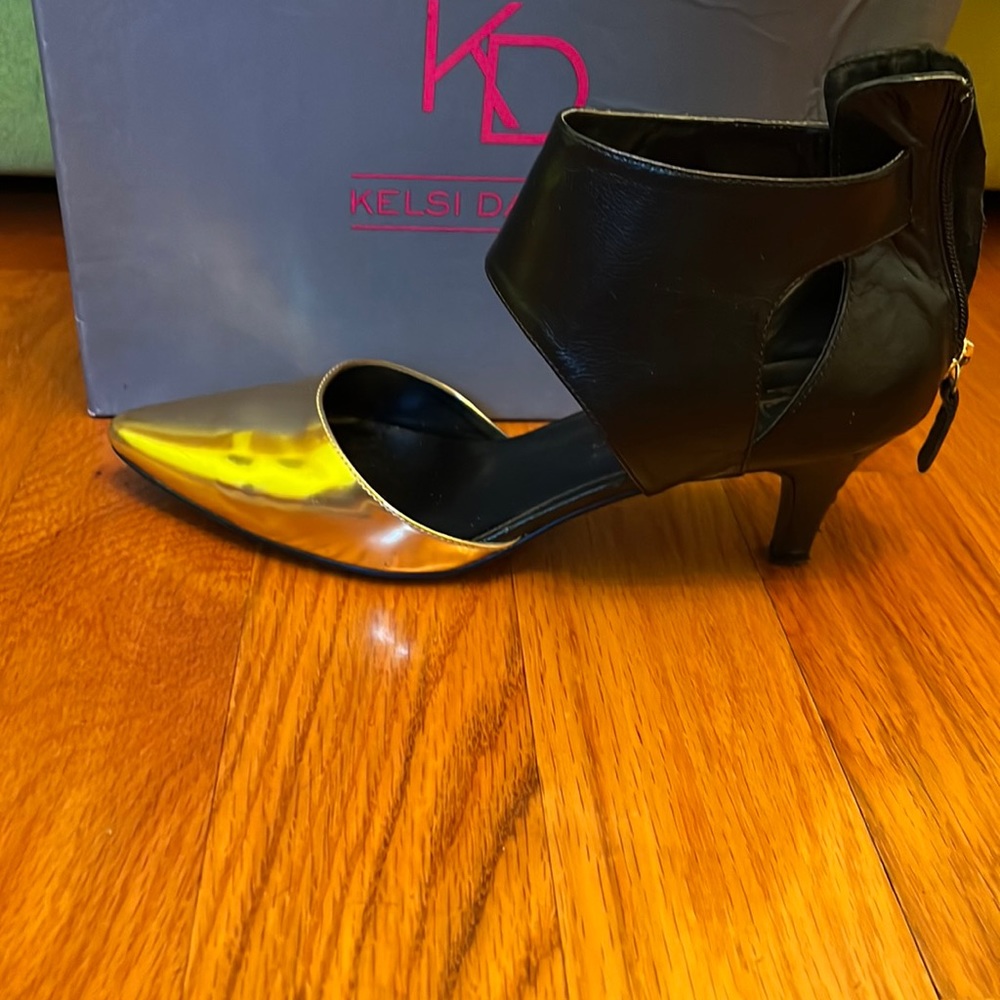 Kelsi Dagger Black and Silver Pointed Toe Ankle Strap Heels